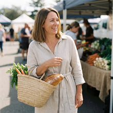 Woman in a linen shirt dress at the Saturday market