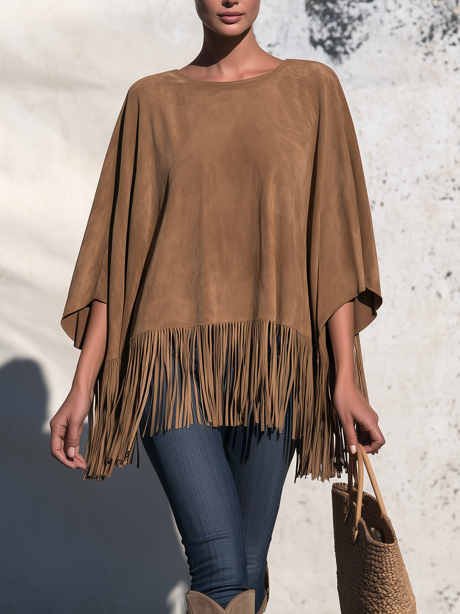 Bartolomea | Poncho in leerkleur met franjes