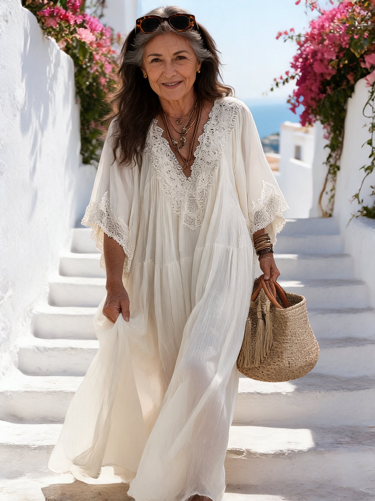 Woman in the Liora maxi dress on holiday in a seaside village